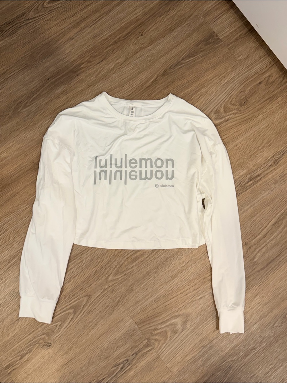 lululemon athletica White Long Sleeve Cropped Tee with Reflective Logo